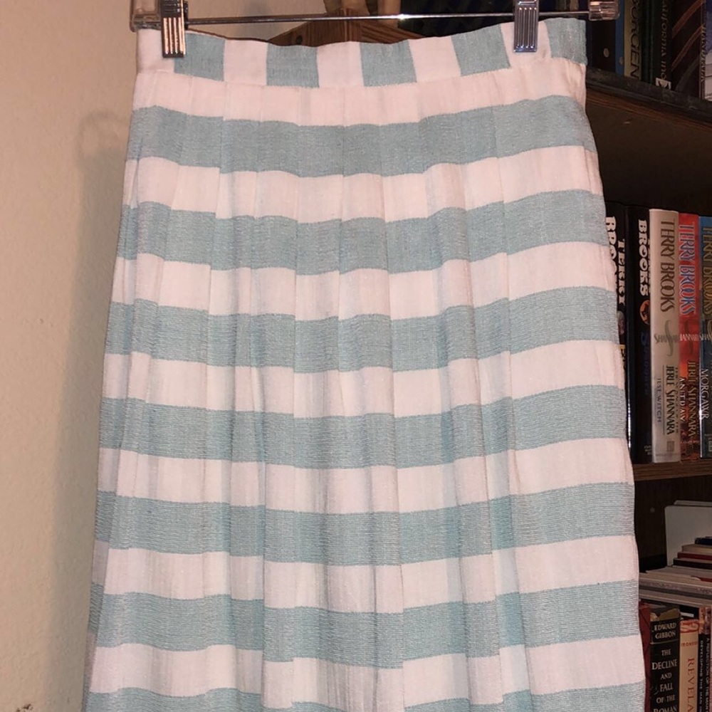Mid length cream and blue skirt